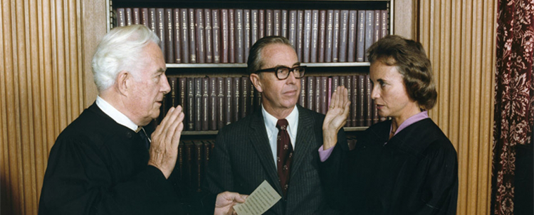 Photograph of Sandra Day O'Connor being sworn in by a Supreme Court Justice by Chief Justice Warren Burger